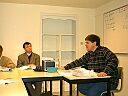 teacher using a cassette recorder in his lecture